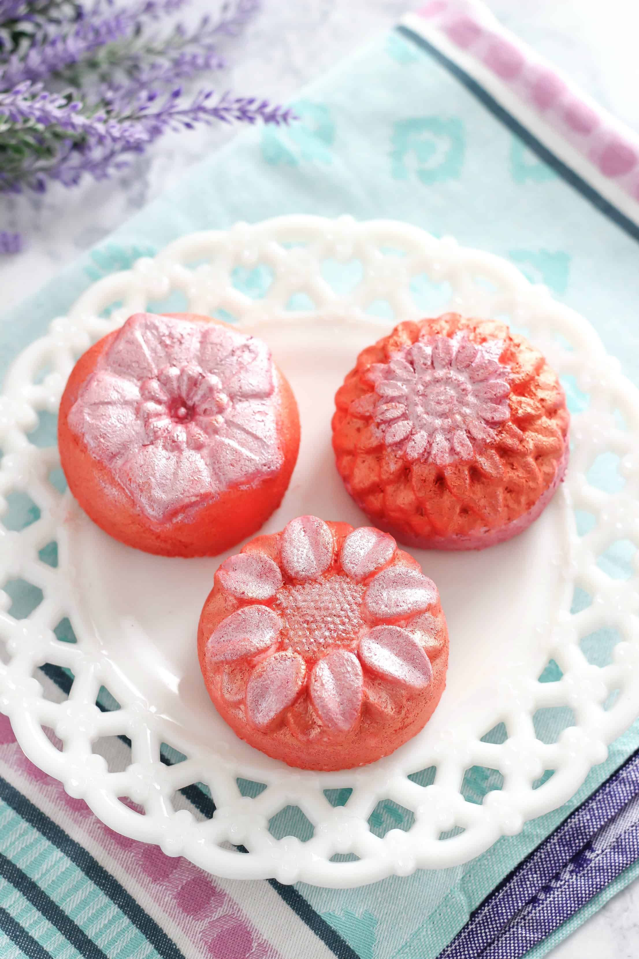 Easily make these DIY Floral Bath Bombs at home with this recipe and video tutorial.  These homemade bath bombs create a relaxing spa-like bath experience and make great gifts! #bathbombs #diybathbombs #bathbombrecipe #soap #healthandbeauty