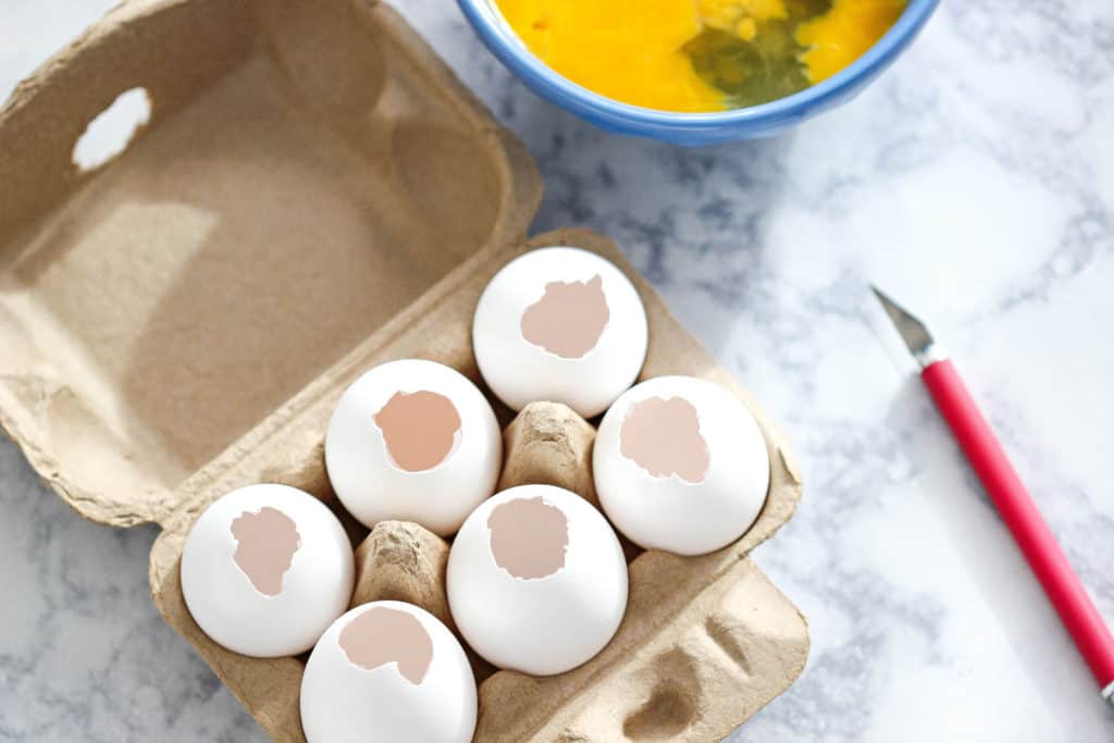 With Easter just around the corner, we have been saving all of our eggshells. Learn how to make a pretty candle in an eggshell just in time for spring. #springdecor #easterdecor #eastercrafts #eggshellcrafts #eggshellcandle #diyeggshellcandle