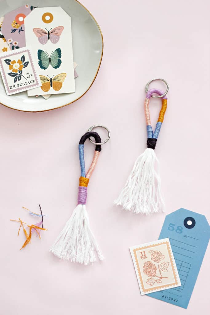 Learn How To Make A Colorful, Fun Rope And Yarn Keychain using regular household items like cotton and embroidery thread. #diy #keychain #howtomake #yarn #kidscrafts