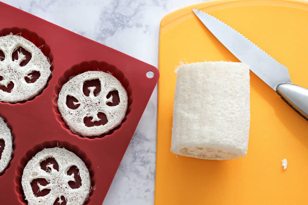 Is your dry, aching skin in need of care? Learn how to make soothing blood orange and lime loofah soap - so easy for a relaxing spa-like bath experience. #soap #loofahsoap #soapmaking #diy #giftideas