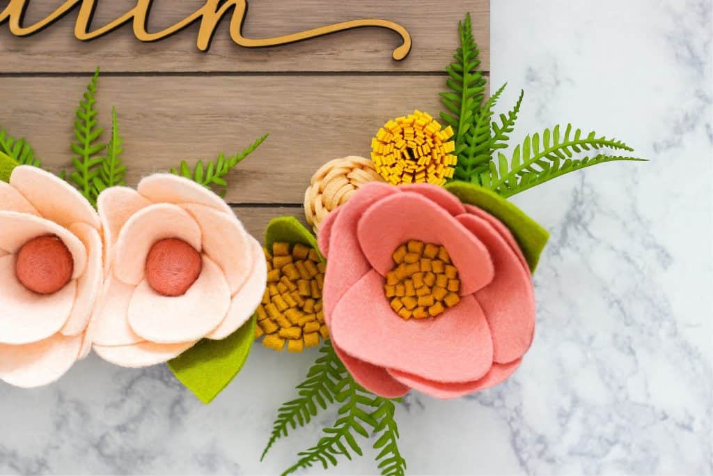 Today I’m sharing how to make a cute diy sign when you're not a diyer, no special tools or machines required. #diysign #woodsign #feltflowers #diy #craft #easycrafts